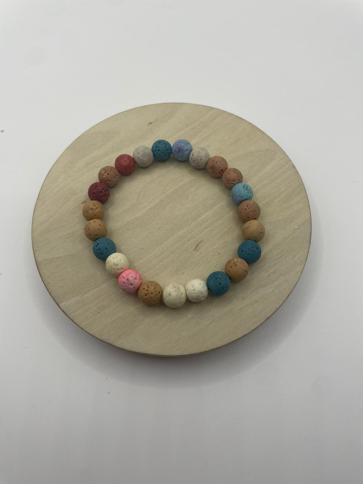 Pulsera de Piedra Volcánica Multicolor – Artesanal y Elástica